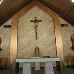 Sanctuary after renovation.  Faux marble on wall panels.  Rippled gold/copper metal leaf on border.